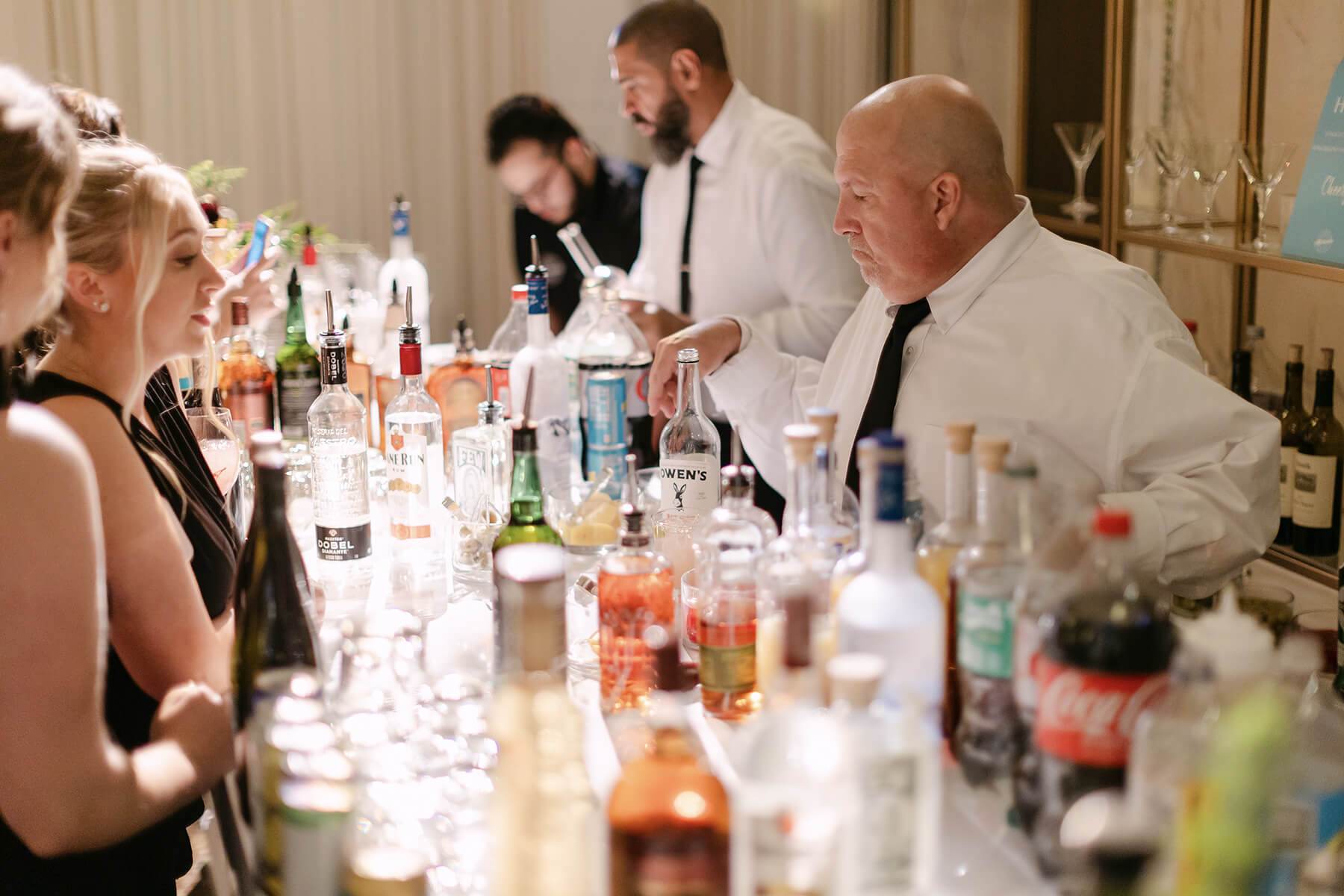 people at busy open bar